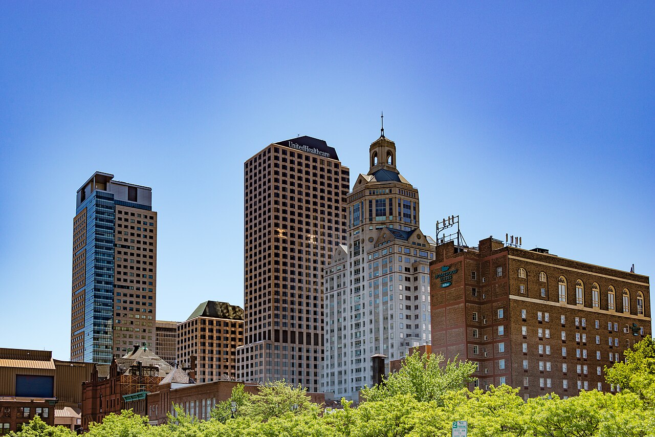 Hartford skyline with downtown buildings including Connecticut State Capitol, representing the state's commercial center